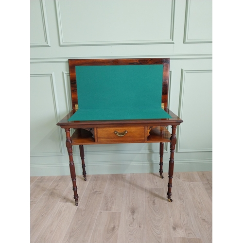 271 - Good quality 19th C. rosewood inlaid turn over leaf card table with single drawer in the frieze rais... 