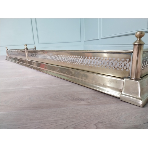 273 - Good quality 19th C. pierced brass fire fender {20 cm H x 194 cm W x 51 cm D}.