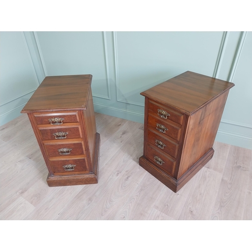 291 - Pair of Edwardian walnut bedside lockers with four graduated drawers and brass handles.