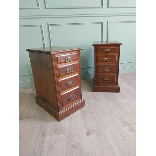 291 - Pair of Edwardian walnut bedside lockers with four graduated drawers and brass handles.