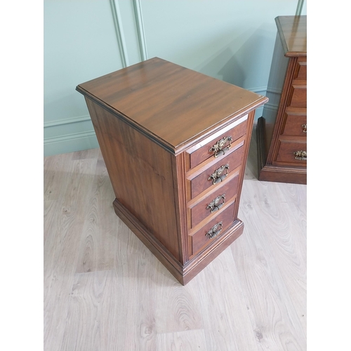 291 - Pair of Edwardian walnut bedside lockers with four graduated drawers and brass handles.