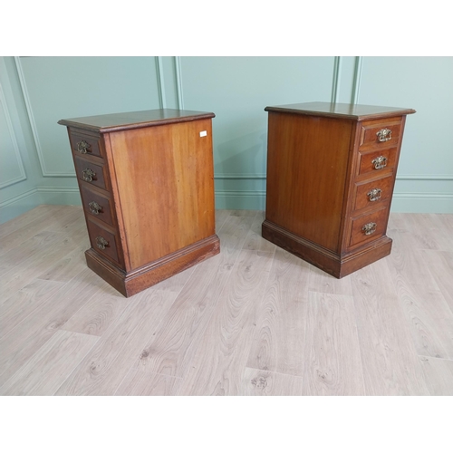 291 - Pair of Edwardian walnut bedside lockers with four graduated drawers and brass handles.