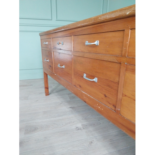 292 - 1950s pine kitchen island with eight bank of drawers raised on square legs {96 cm H x 202 cm W  x 10... 