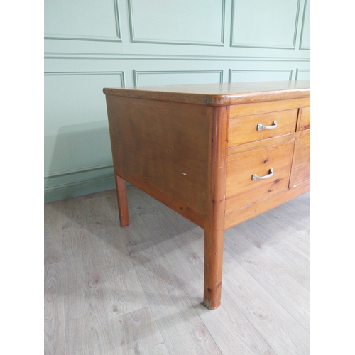 292 - 1950s pine kitchen island with eight bank of drawers raised on square legs {96 cm H x 202 cm W  x 10... 