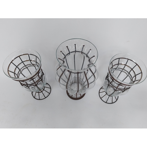 295 - Three vintage glass flower vases in metal surrounds {49 cm H x 26 cm Dia. AND 40 cm H x 20 cm Dia.}.