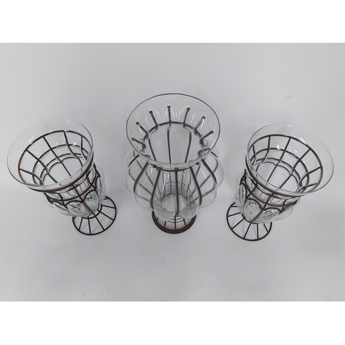 295 - Three vintage glass flower vases in metal surrounds {49 cm H x 26 cm Dia. AND 40 cm H x 20 cm Dia.}.