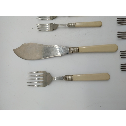 310 - Collection of Sheffield stainless steel cutlery with bone handles.