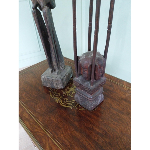 314 - Two African carved hardwood figures {101 cm H and 70 cm H}.