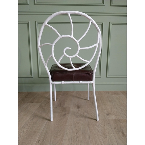 332 - Set of four good quality cast iron chairs with branch decoration and leather upholstered seats {90 c... 