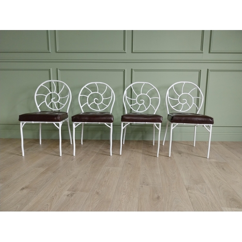 332 - Set of four good quality cast iron chairs with branch decoration and leather upholstered seats {90 c... 