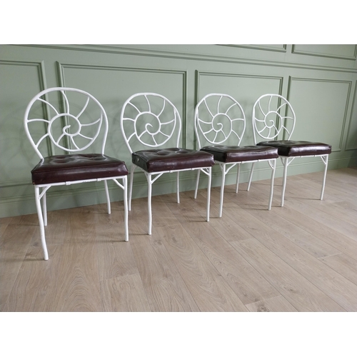 332 - Set of four good quality cast iron chairs with branch decoration and leather upholstered seats {90 c... 