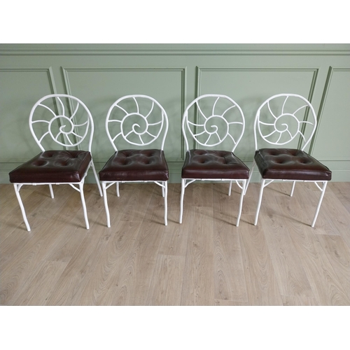 332 - Set of four good quality cast iron chairs with branch decoration and leather upholstered seats {90 c... 