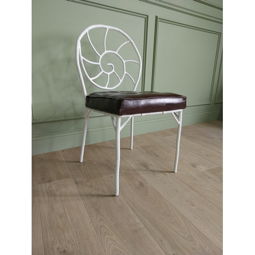 332 - Set of four good quality cast iron chairs with branch decoration and leather upholstered seats {90 c... 