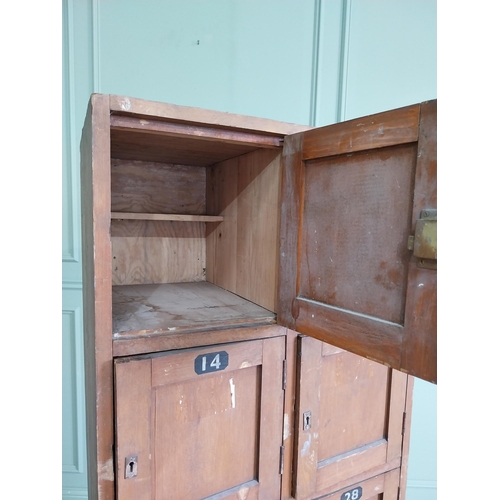 34 - 1950s stained pine bank of lockers {169 cm H x 63 cm W x 43 cm D}.