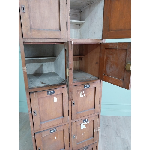 34 - 1950s stained pine bank of lockers {169 cm H x 63 cm W x 43 cm D}.