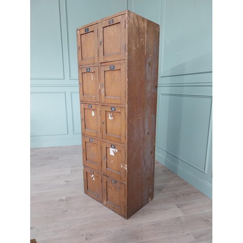 34 - 1950s stained pine bank of lockers {169 cm H x 63 cm W x 43 cm D}.