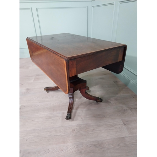 350 - 19th C. mahogany and satinwood drop leaf table raised on square pedestal, four outswept legs and bra... 