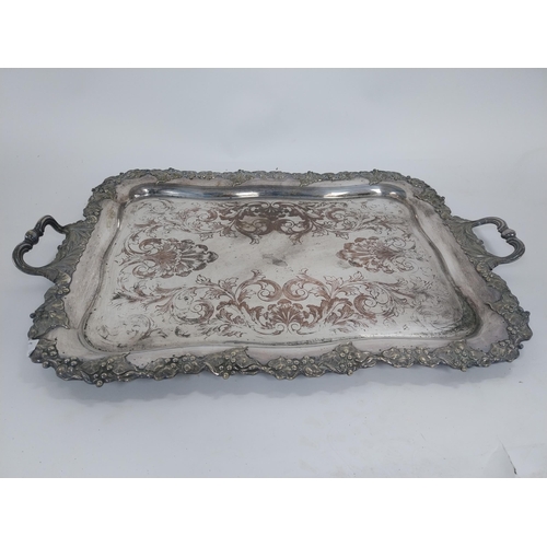 353 - Good quality early 20th C. silverplate serving tray decorated with grape vines presented to T. Hanra... 