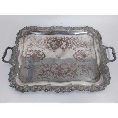 353 - Good quality early 20th C. silverplate serving tray decorated with grape vines presented to T. Hanra... 