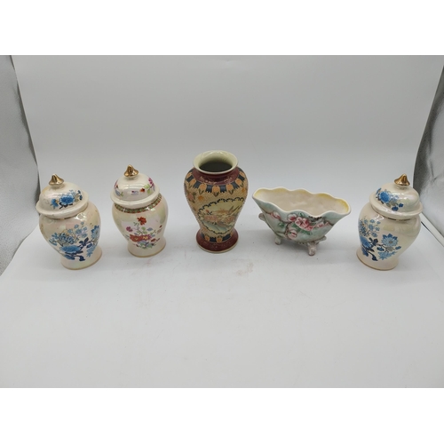 358 - Three decorative hand painted ceramic lidded urns, one ceramic vase and one ceramic bowl.