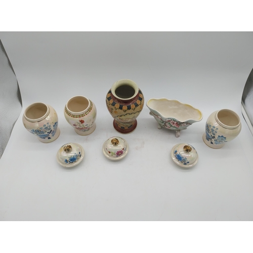 358 - Three decorative hand painted ceramic lidded urns, one ceramic vase and one ceramic bowl.