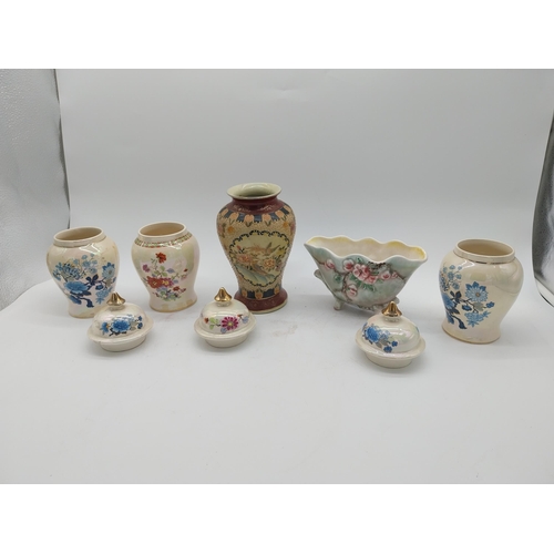 358 - Three decorative hand painted ceramic lidded urns, one ceramic vase and one ceramic bowl.