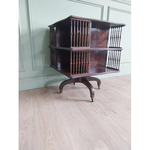 364 - 19th C. rosewood revolving bookcase by Howard and Sons {75 cm H x 60 cm W x 60 cm D}.