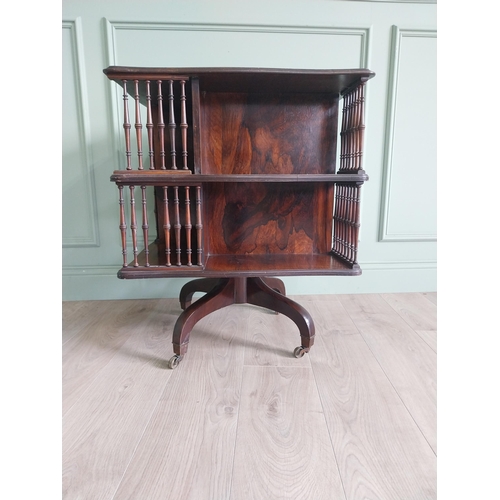 364 - 19th C. rosewood revolving bookcase by Howard and Sons {75 cm H x 60 cm W x 60 cm D}.