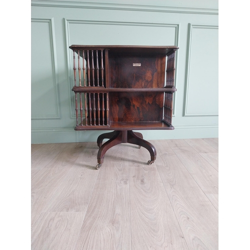 364 - 19th C. rosewood revolving bookcase by Howard and Sons {75 cm H x 60 cm W x 60 cm D}.