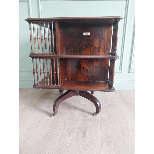 364 - 19th C. rosewood revolving bookcase by Howard and Sons {75 cm H x 60 cm W x 60 cm D}.