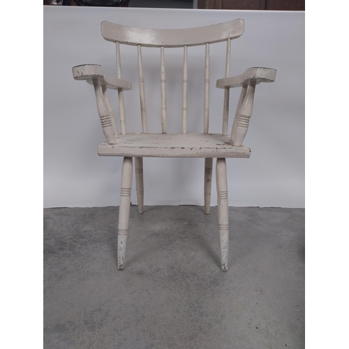 38 - Early 20th C. painted pine hedge chair raised on turned legs {91 cm H x 64 cm W x 55 cm D}.