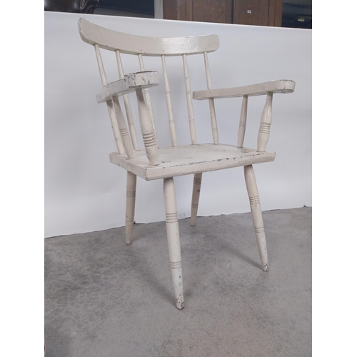 38 - Early 20th C. painted pine hedge chair raised on turned legs {91 cm H x 64 cm W x 55 cm D}.