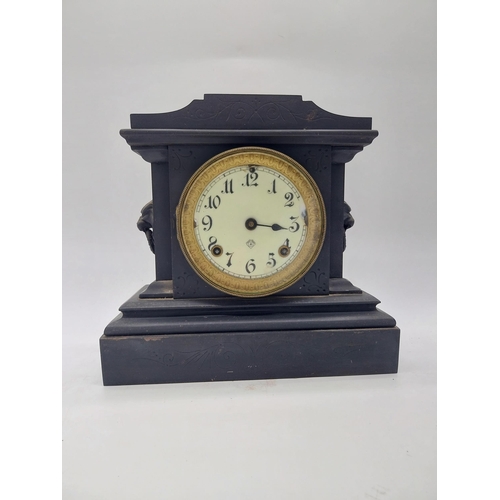 414 - Two 19th C. slate mantle clocks with enamel dials {30 cm H x 38 cm W x 16 cm D and 28 cm H x 29 cm W... 