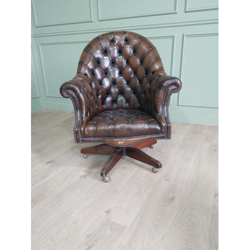 432 - Exceptional quality hand dyed deep buttoned leather upholstered swivel office chair. {105 cm H x 85 ... 