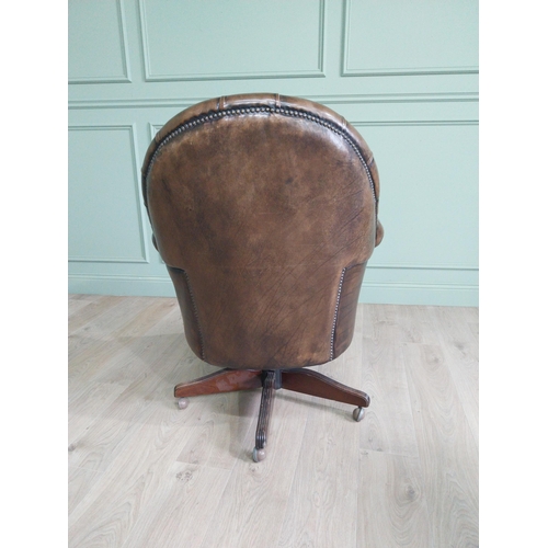 432 - Exceptional quality hand dyed deep buttoned leather upholstered swivel office chair. {105 cm H x 85 ... 