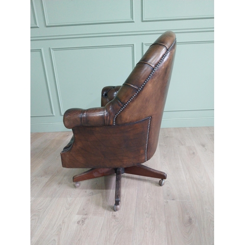 432 - Exceptional quality hand dyed deep buttoned leather upholstered swivel office chair. {105 cm H x 85 ... 