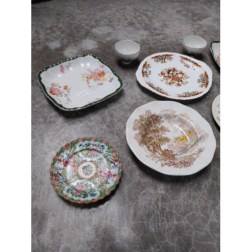 437 - Seven ceramic plates and two small Arklow pottery bowls.