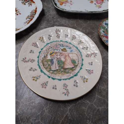 437 - Seven ceramic plates and two small Arklow pottery bowls.