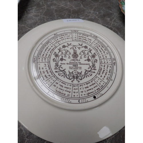 437 - Seven ceramic plates and two small Arklow pottery bowls.