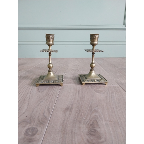 438 - Pair of decorative brass candlesticks in the Georgian style {17 cm H x 8 cm W x 8 cm D}.