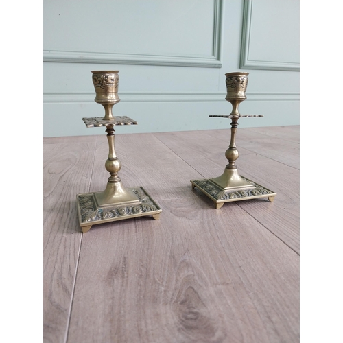 438 - Pair of decorative brass candlesticks in the Georgian style {17 cm H x 8 cm W x 8 cm D}.