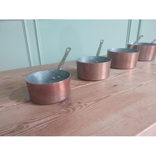 45 - Good quality early 20th C. set of French four graduated copper saucepans {16 cm H x 35 cm W x 18 cm ... 