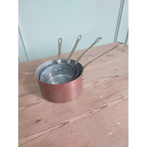 45 - Good quality early 20th C. set of French four graduated copper saucepans {16 cm H x 35 cm W x 18 cm ... 