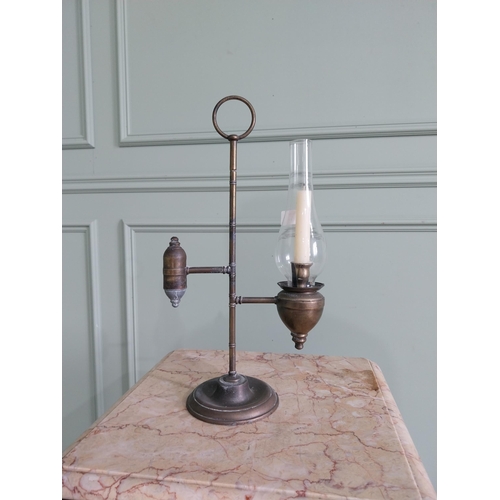 460 - Edwardian brass students lamp with glass chimney {43 cm H x 24 cm W x 13 cm D}.