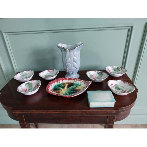 461 - Collection of nine pieces of early 20th C. ceramic dishes and vase.