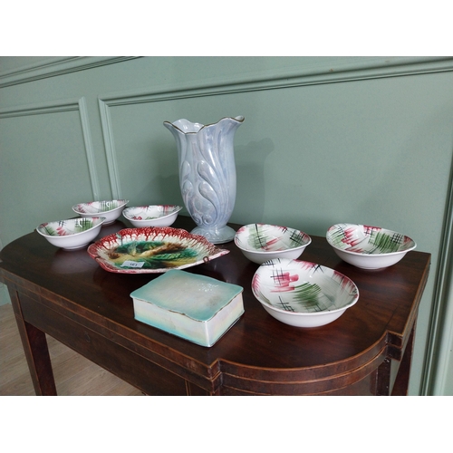 461 - Collection of nine pieces of early 20th C. ceramic dishes and vase.