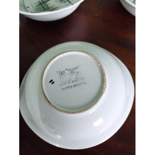 461 - Collection of nine pieces of early 20th C. ceramic dishes and vase.