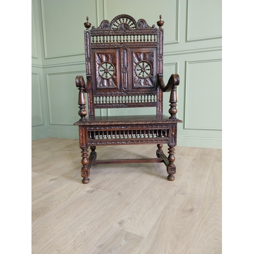 462 - 19th C. carved oak throne chair in the Tudor style {140 cm H x 80 cm W x 52 cm D}.