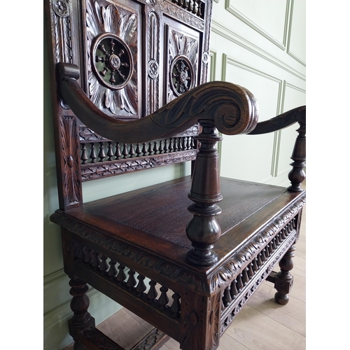 462 - 19th C. carved oak throne chair in the Tudor style {140 cm H x 80 cm W x 52 cm D}.
