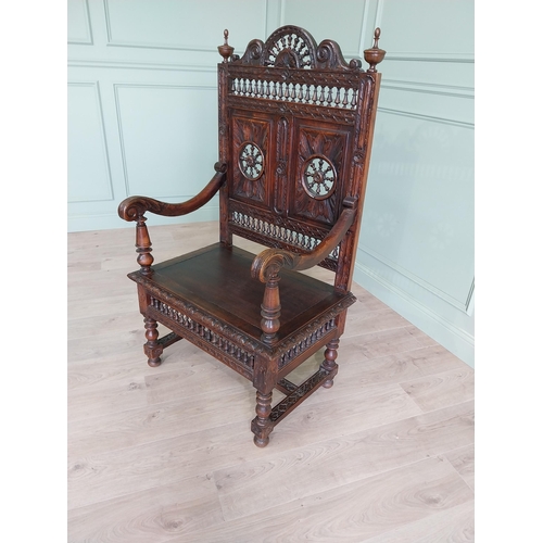 462 - 19th C. carved oak throne chair in the Tudor style {140 cm H x 80 cm W x 52 cm D}.